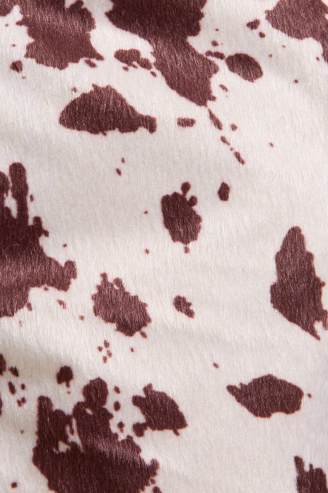 MID-RISE SUEDE COW PRINT SHORTS