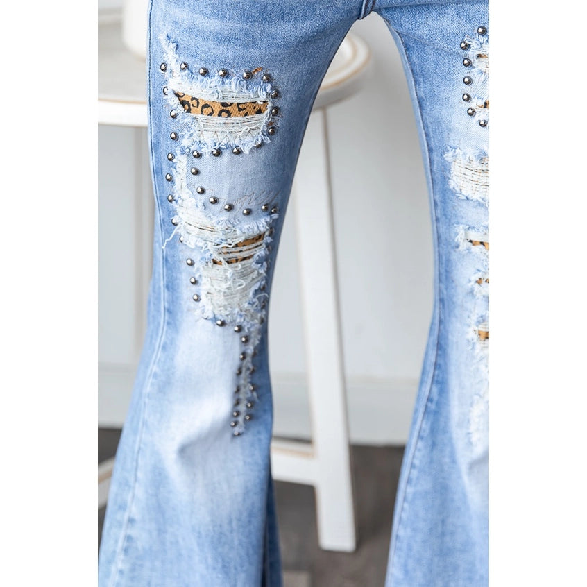 Distressed, studded leopard flares
