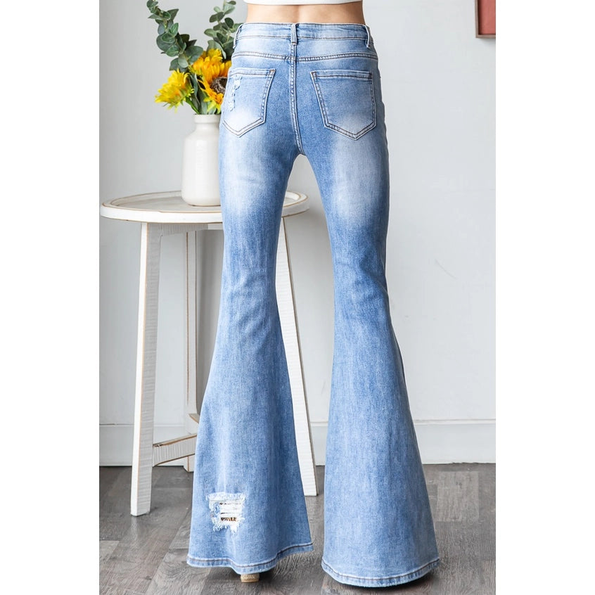 Distressed, studded leopard flares