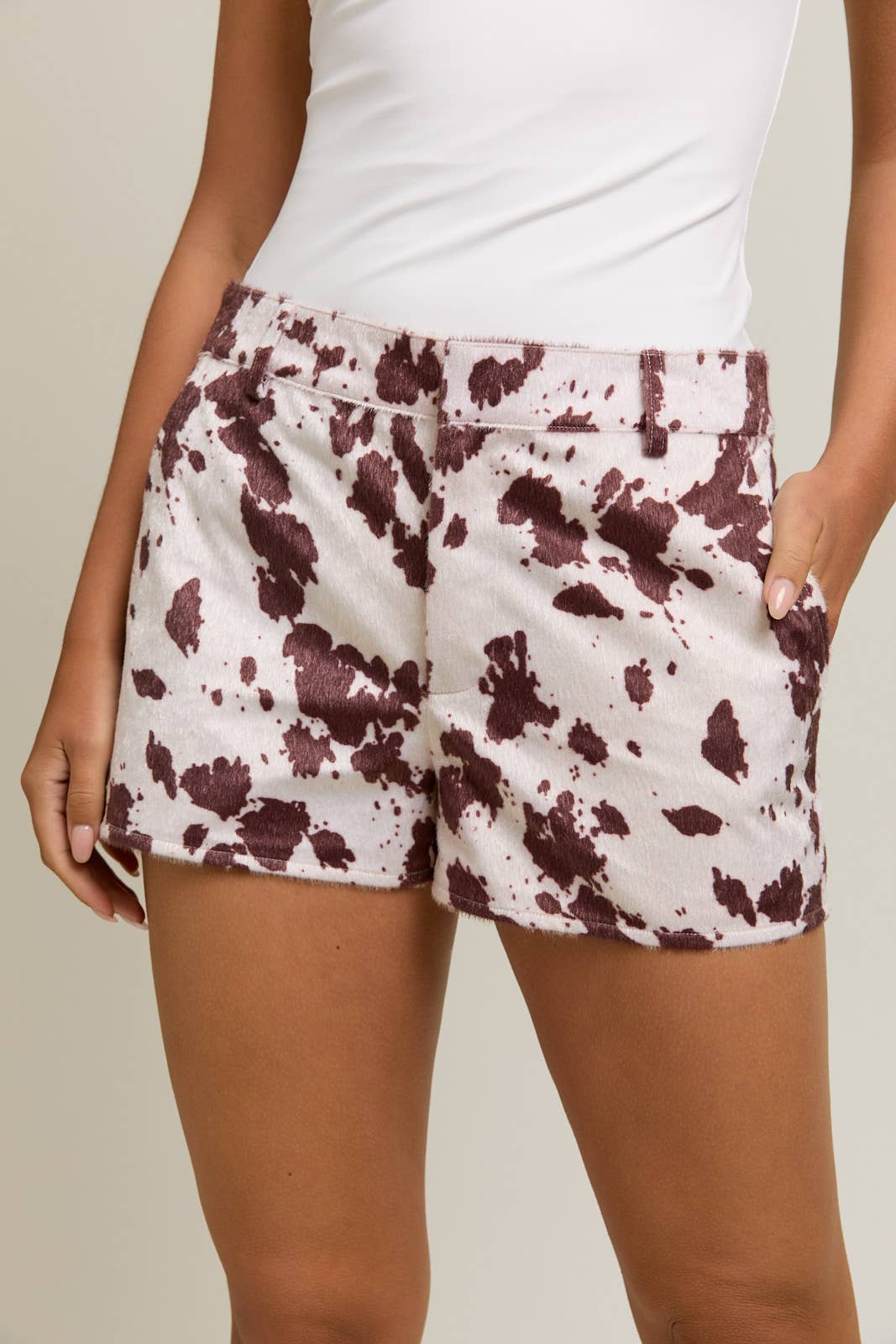 MID-RISE SUEDE COW PRINT SHORTS