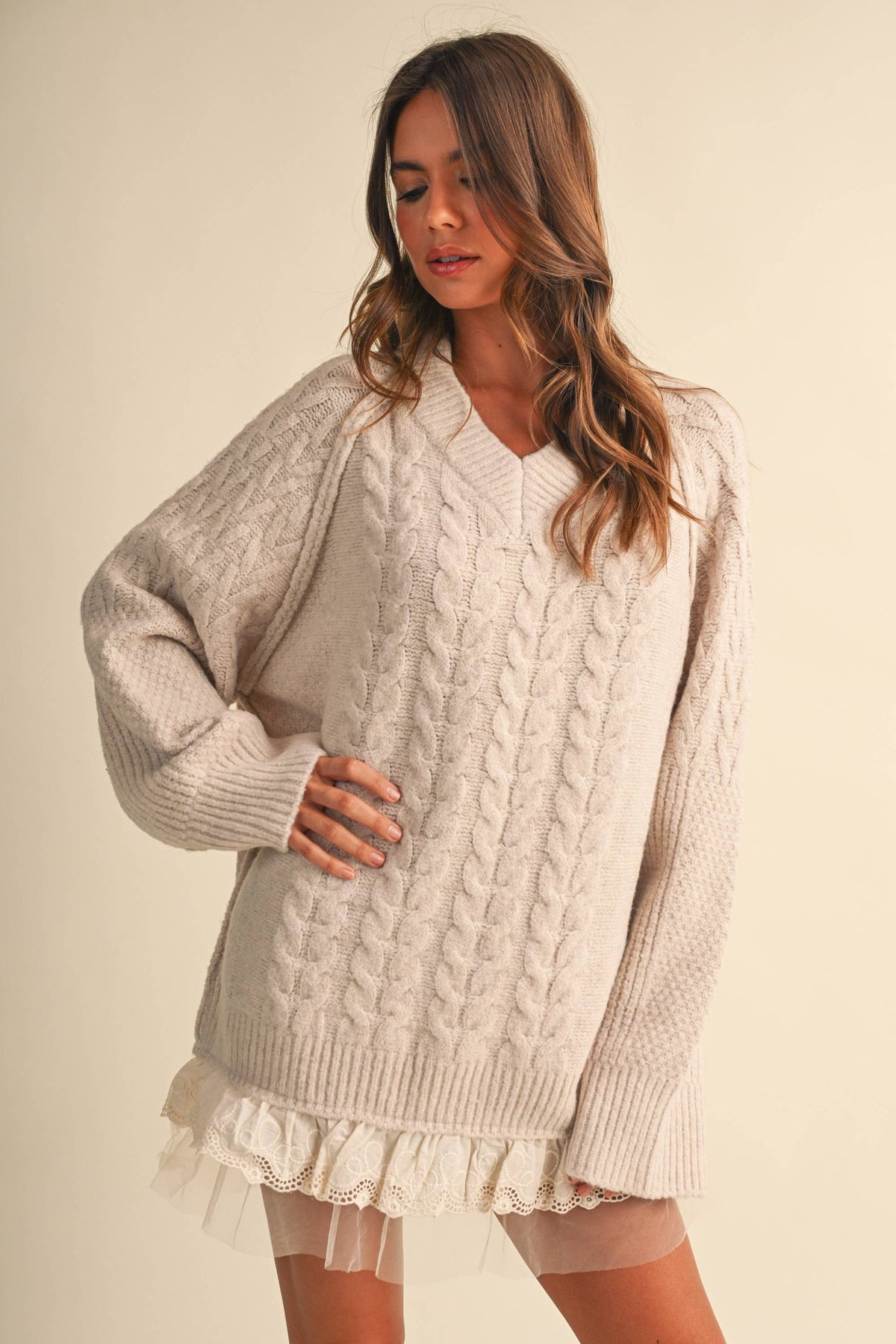 CABLE SWEATER MINI DRESS WITH LACE TRIM ON THE BOTTO
