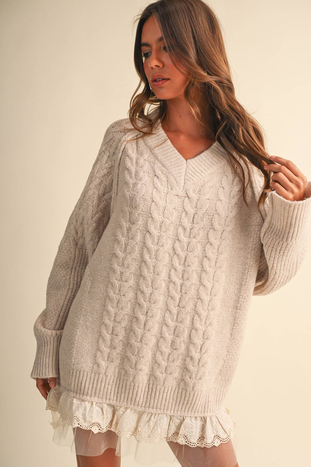 CABLE SWEATER MINI DRESS WITH LACE TRIM ON THE BOTTO