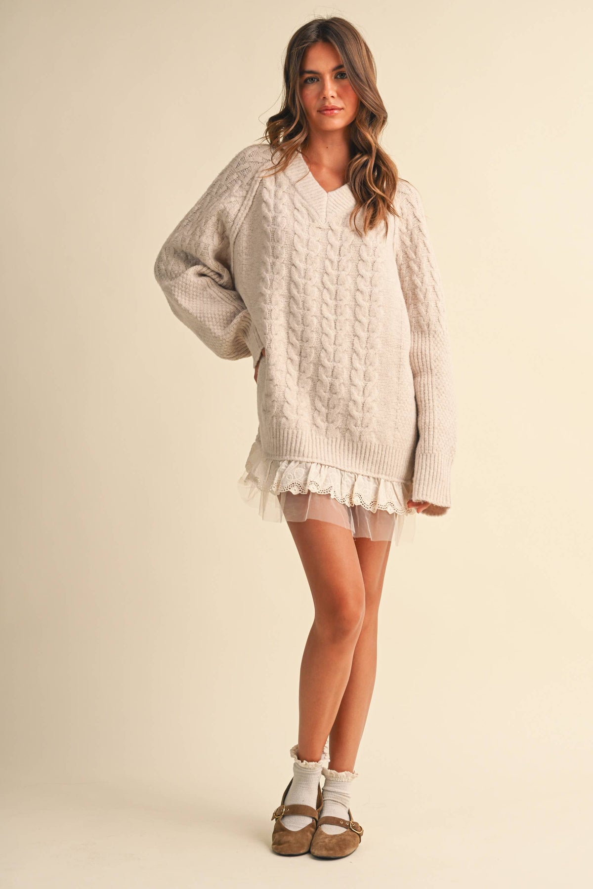 CABLE SWEATER MINI DRESS WITH LACE TRIM ON THE BOTTO