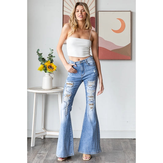 Distressed, studded leopard flares