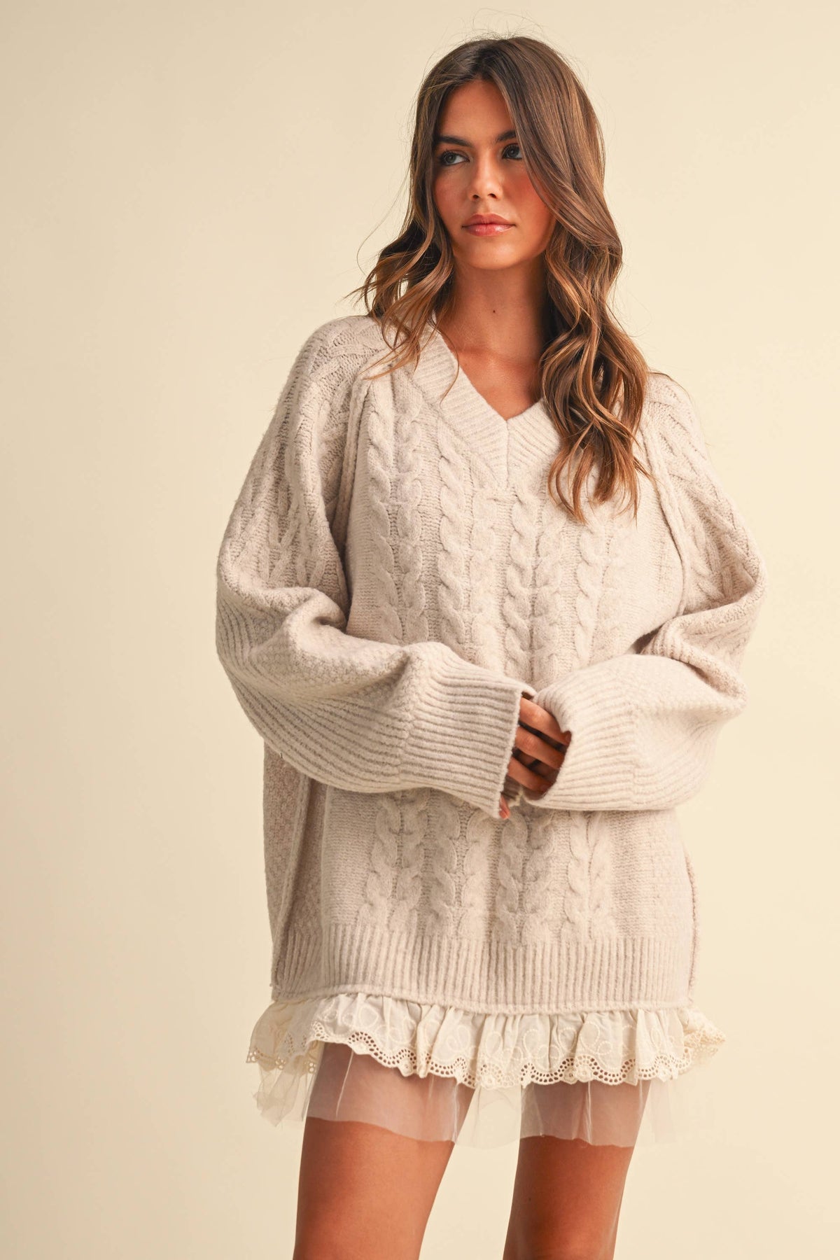 CABLE SWEATER MINI DRESS WITH LACE TRIM ON THE BOTTO