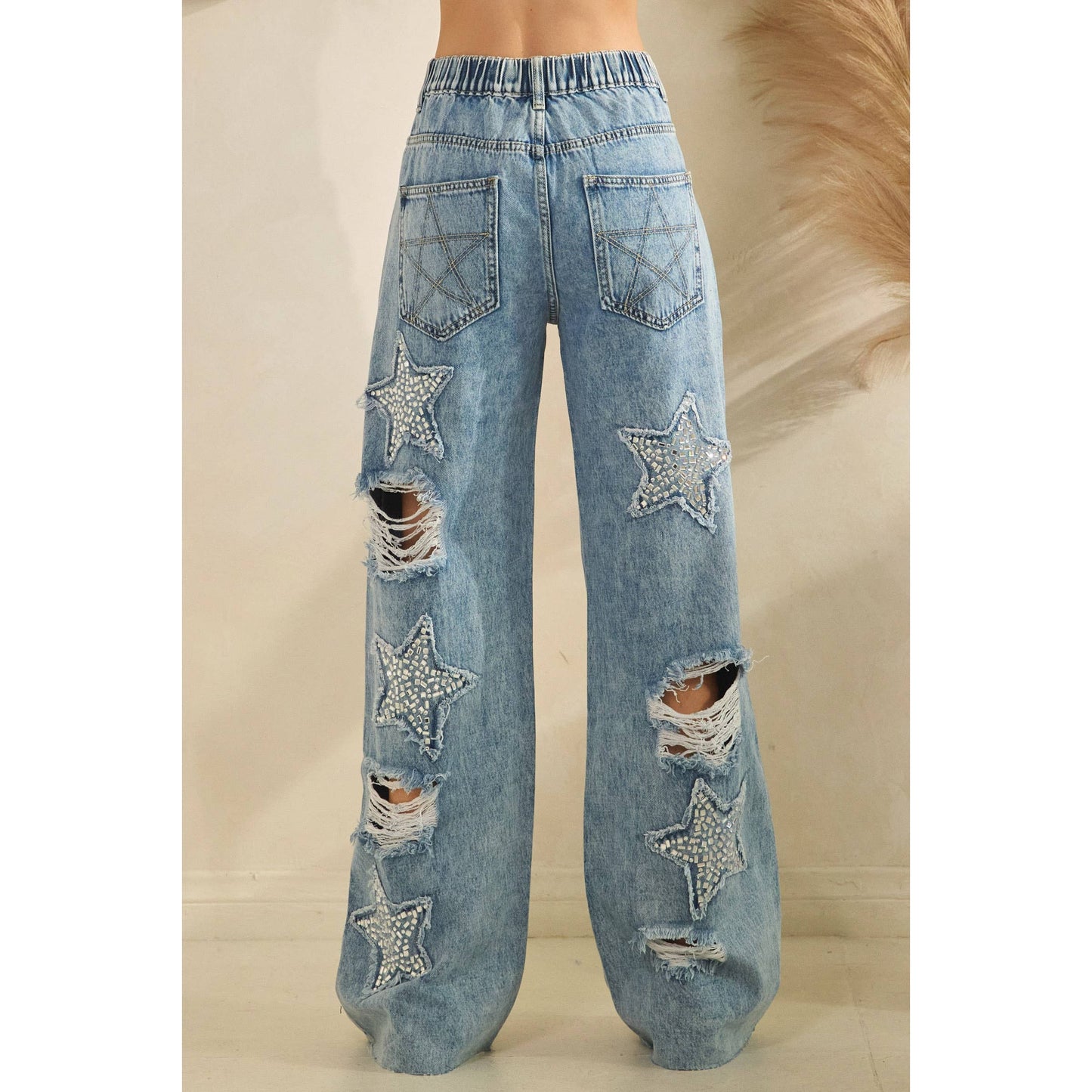 WASHED STONE ON STAR DENIM PANTS